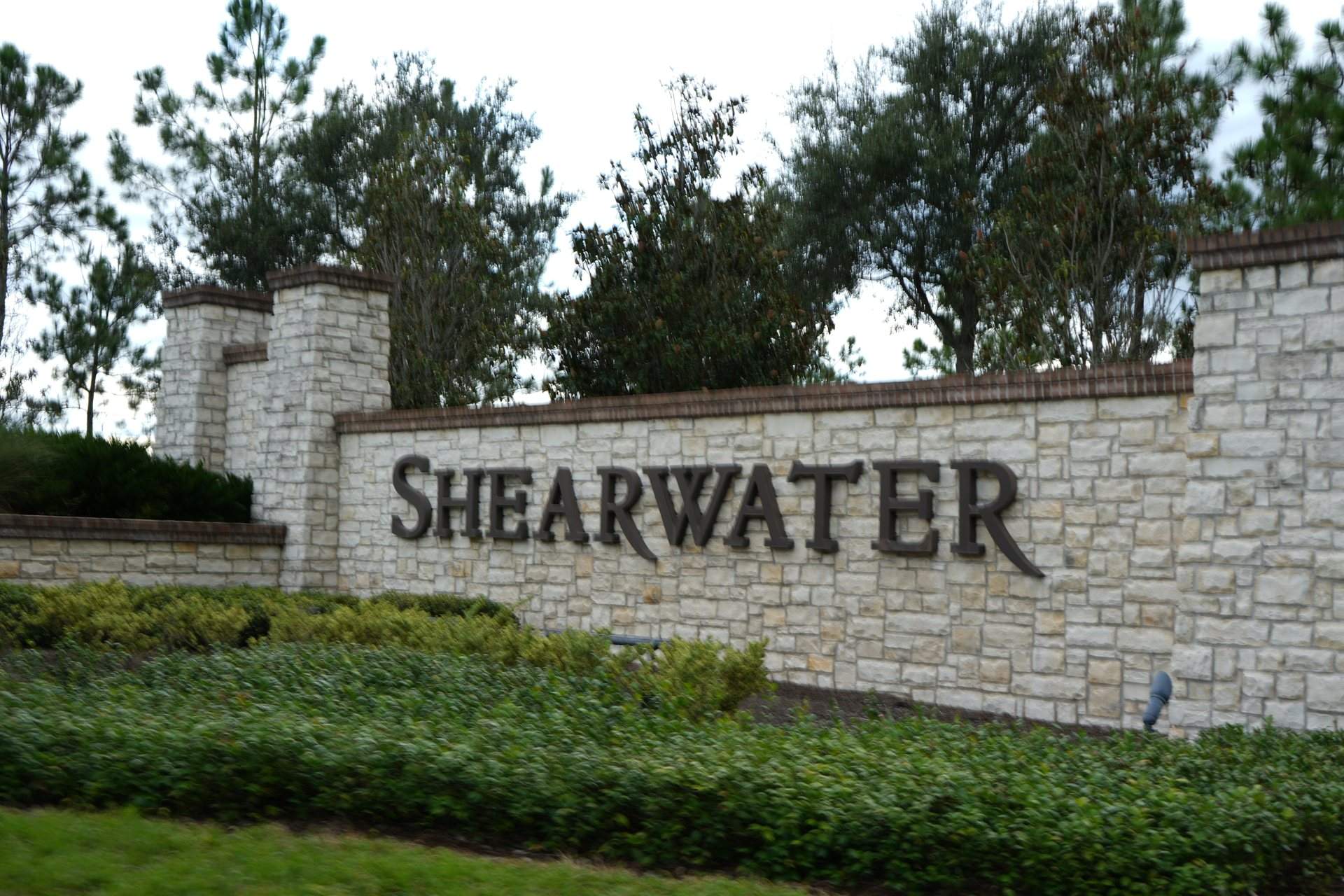 Shearwater stone entrance wall with the community name